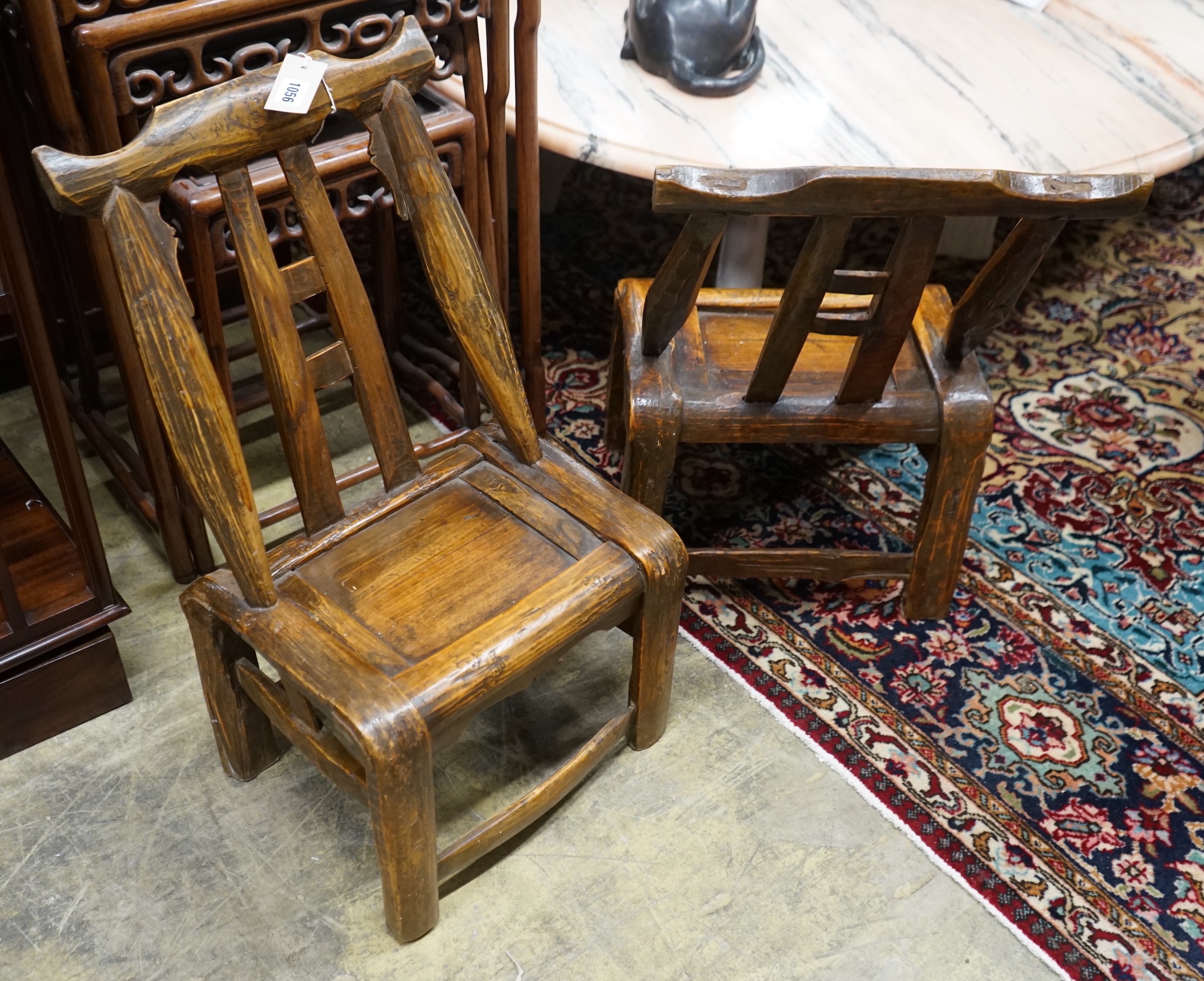 Four Chinese elm yoke back child's chairs